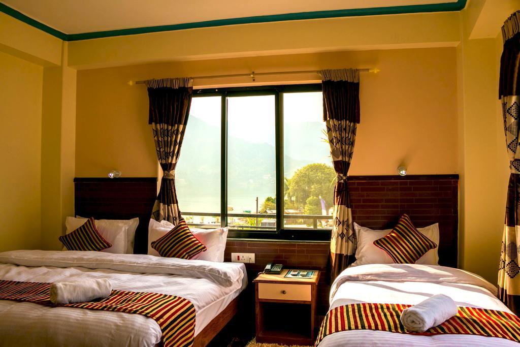 Hotel Adam Pokhara Chambre photo